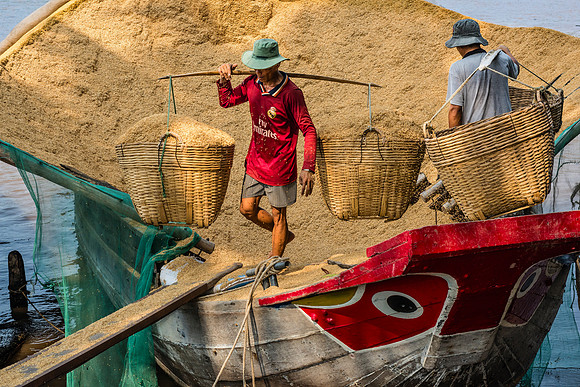 Unloading Rice Hulls - Mekong